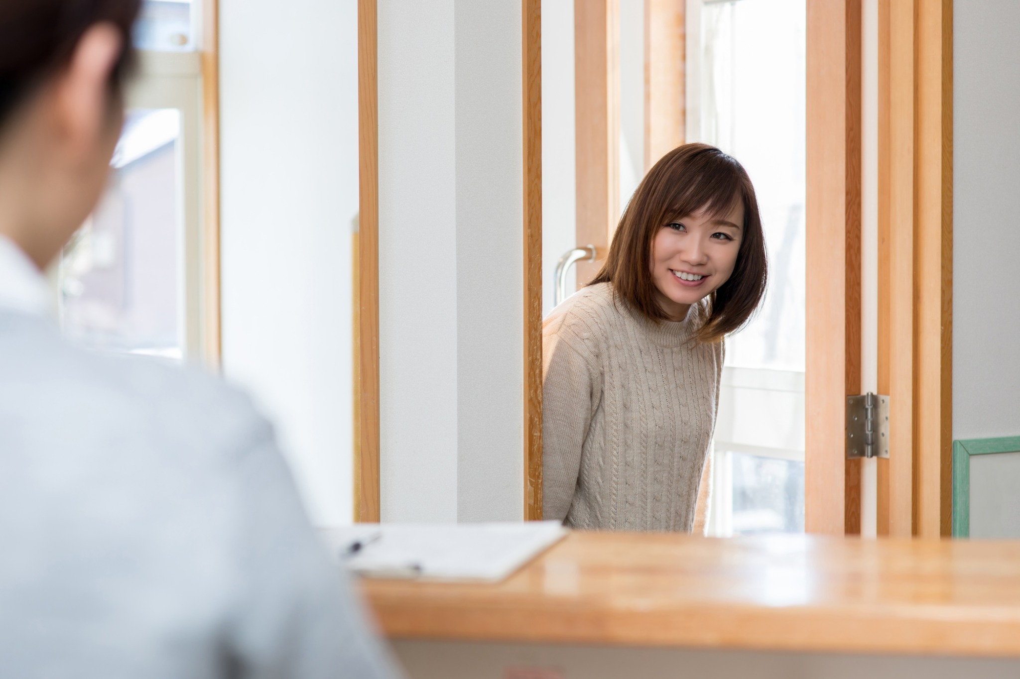 予防歯科のため歯科を受診する女性