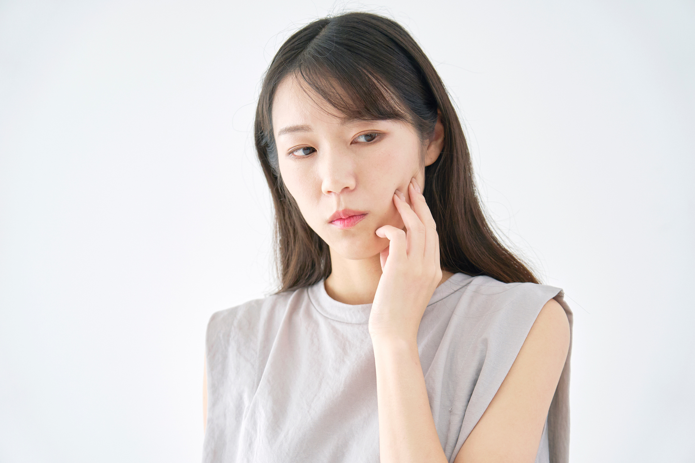 インプラント手術後の痛みが続く人