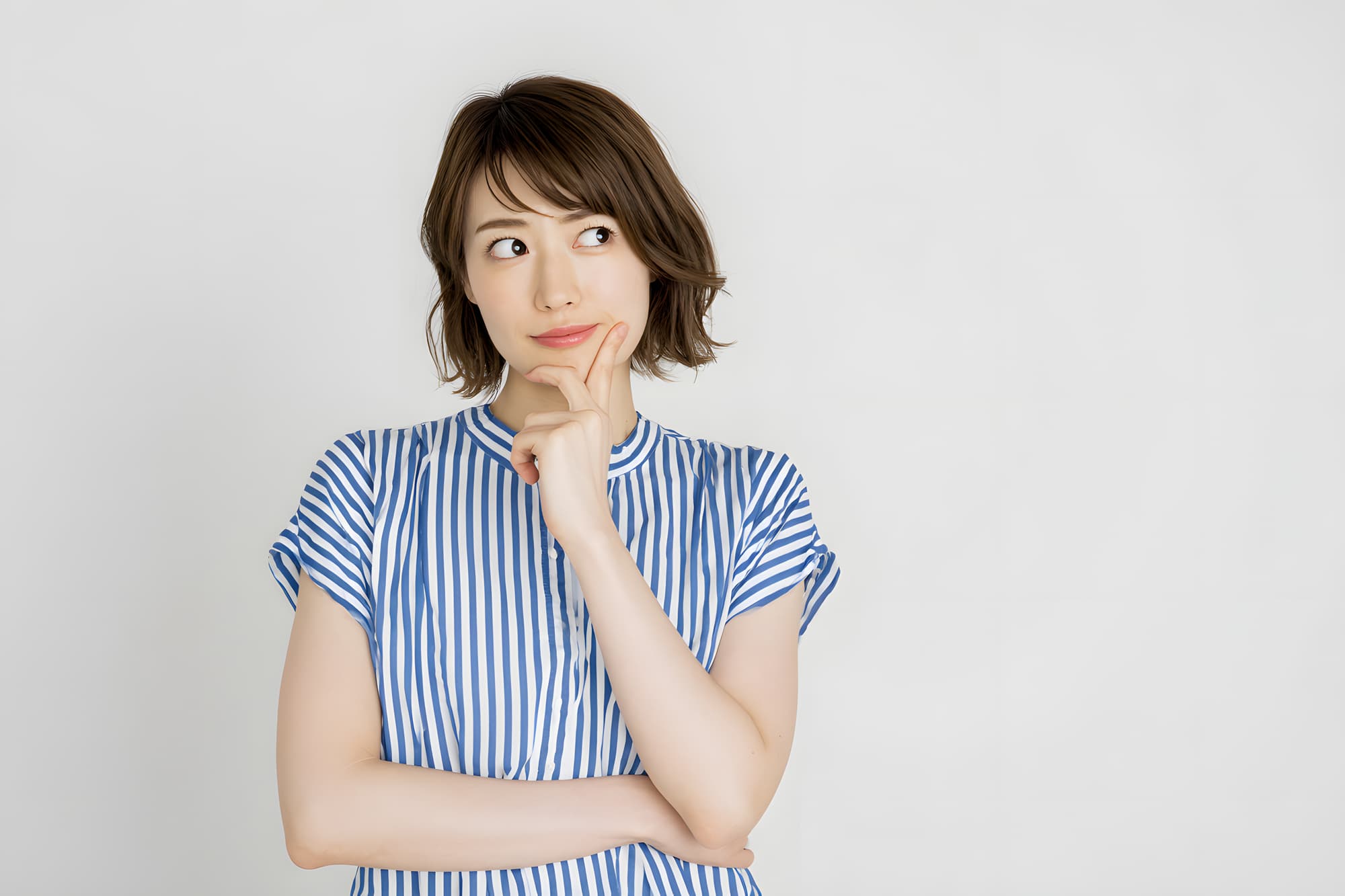 歯医者でクリーニングだけは受けられるのか考える女性